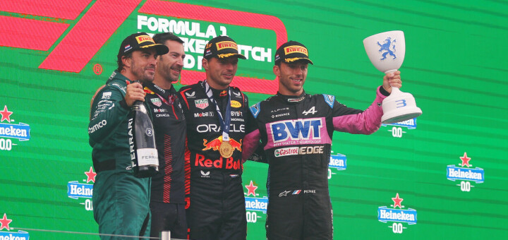 ZANDVOORT, NETHERLANDS - AUGUST 27: Race winner Max Verstappen of the Netherlands and Oracle Red Bull Racing (second from right), Second placed Fernando Alonso of Spain and Aston Martin F1 Team (L), Third placed Pierre Gasly of France and Alpine F1 (R) and Edward Aveling, Chief Designer at Red Bull Racing (second from left) celebrate on the podium during the F1 Grand Prix of The Netherlands at Circuit Zandvoort on August 27, 2023 in Zandvoort, Netherlands. (Photo by Dean Mouhtaropoulos/Getty Images) // Getty Images / Red Bull Content Pool // SI202308270847 // Usage for editorial use only //